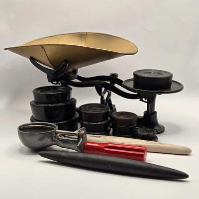 LOT 88B: Vintage Balance Scale with Iron Weights and Brass Holder, Antique Honing Stone, Stone Rolling Pin, and Scoop Master Ice Cream Scoop