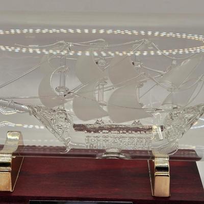 LOT 100B: Lighthouse Plate/Light, Two Ships in Bottles, and Vintage Jennings Bros. Silver Tone Sailboat Paperweight