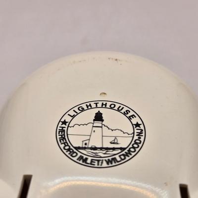 LOT 100B: Lighthouse Plate/Light, Two Ships in Bottles, and Vintage Jennings Bros. Silver Tone Sailboat Paperweight