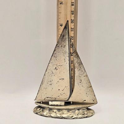 LOT 100B: Lighthouse Plate/Light, Two Ships in Bottles, and Vintage Jennings Bros. Silver Tone Sailboat Paperweight