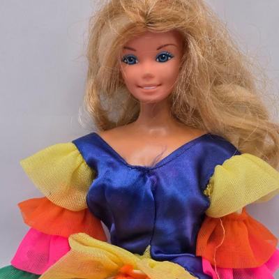 LOT 101B: Vintage Barbies Including Bubble Cut Doll and Barbie Dictionary