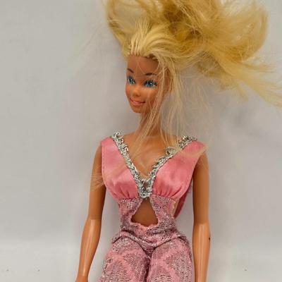 LOT 101B: Vintage Barbies Including Bubble Cut Doll and Barbie Dictionary