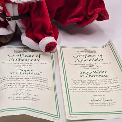 LOT 109K: Hiiii HOOOOO!!! Snow White and the Seven Dwarfs Dressed in Their Christmas Best. All with COA and Original Boxes