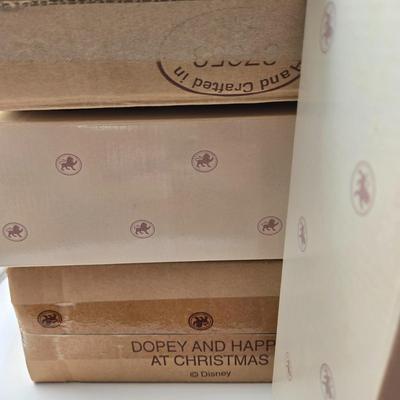 LOT 109K: Hiiii HOOOOO!!! Snow White and the Seven Dwarfs Dressed in Their Christmas Best. All with COA and Original Boxes