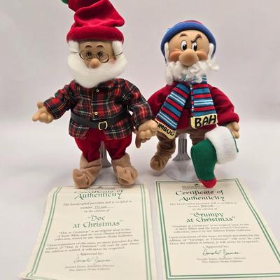 LOT 109K: Hiiii HOOOOO!!! Snow White and the Seven Dwarfs Dressed in Their Christmas Best. All with COA and Original Boxes