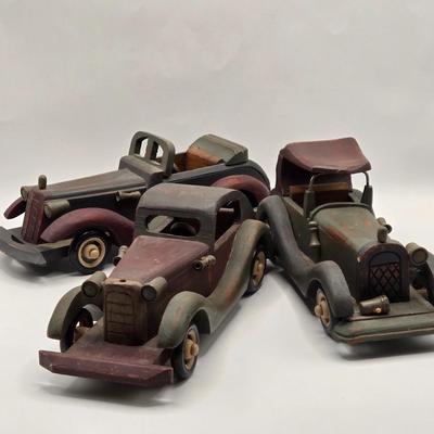 LOT 125K: Three Vintage Wooden Model Cars