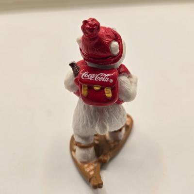 LOT 133K: Plastic Santa, Green Wooden Santa, Set of Coke-a-Cola Bears, Small Plastic Santas Playing Instruments, Clip on Holly Earrings,...