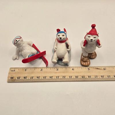 LOT 133K: Plastic Santa, Green Wooden Santa, Set of Coke-a-Cola Bears, Small Plastic Santas Playing Instruments, Clip on Holly Earrings,...