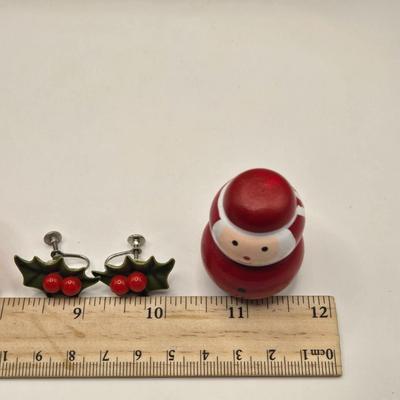 LOT 133K: Plastic Santa, Green Wooden Santa, Set of Coke-a-Cola Bears, Small Plastic Santas Playing Instruments, Clip on Holly Earrings,...