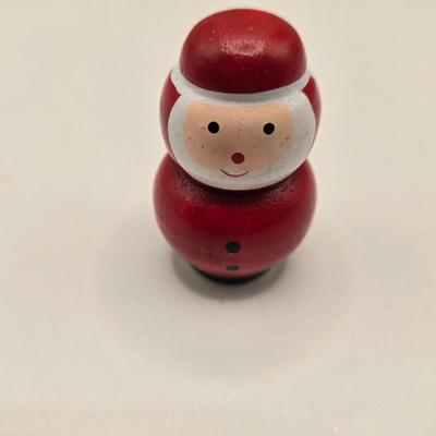 LOT 133K: Plastic Santa, Green Wooden Santa, Set of Coke-a-Cola Bears, Small Plastic Santas Playing Instruments, Clip on Holly Earrings,...