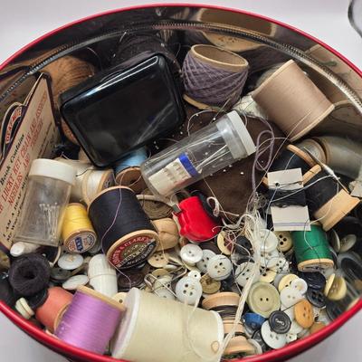 LOT 142K: Button Books For Collectors, Box of Hand Made Doilies with Thread, Small Basket of Pins and More, and Cookie Tin filled with...