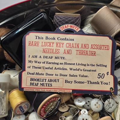 LOT 142K: Button Books For Collectors, Box of Hand Made Doilies with Thread, Small Basket of Pins and More, and Cookie Tin filled with...