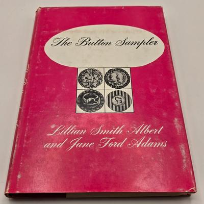 LOT 142K: Button Books For Collectors, Box of Hand Made Doilies with Thread, Small Basket of Pins and More, and Cookie Tin filled with...