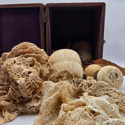 LOT 142K: Button Books For Collectors, Box of Hand Made Doilies with Thread, Small Basket of Pins and More, and Cookie Tin filled with...