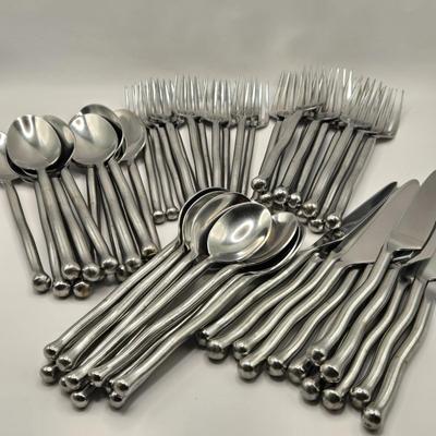 LOT 143K: Set or Stainless Steel Flat Ware Including 11 Dinner Forks, 10 salad Forks, 12 Table Spoons, 11 Teaspoons, and 12 Butter Knives