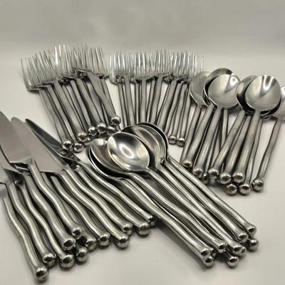 LOT 143K: Set or Stainless Steel Flat Ware Including 11 Dinner Forks, 10 salad Forks, 12 Table Spoons, 11 Teaspoons, and 12 Butter Knives