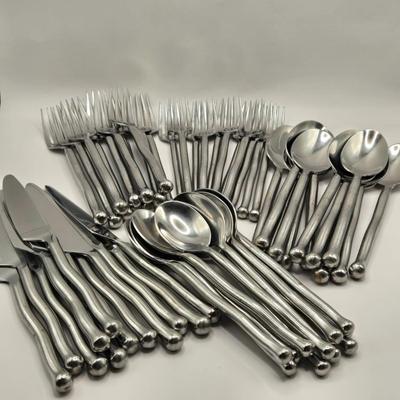 LOT 143K: Set or Stainless Steel Flat Ware Including 11 Dinner Forks, 10 salad Forks, 12 Table Spoons, 11 Teaspoons, and 12 Butter Knives