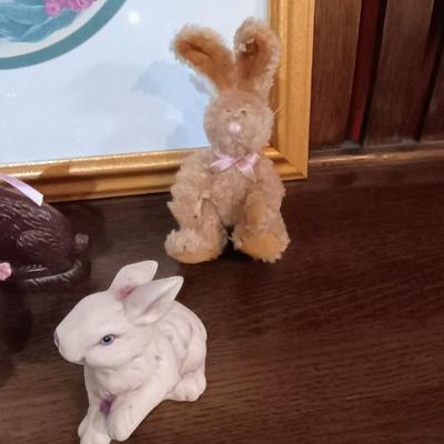 3 GOEBEL RABBITS AMONG A VARIETY OF OTHER EASTER DECOR