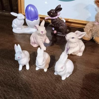 3 GOEBEL RABBITS AMONG A VARIETY OF OTHER EASTER DECOR