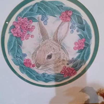 3 GOEBEL RABBITS AMONG A VARIETY OF OTHER EASTER DECOR