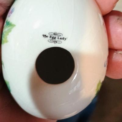 GLASS BASKET FILLED WITH HAND PAINTED CERAMIC EGGS