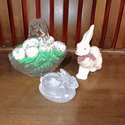 GLASS BASKET FILLED WITH HAND PAINTED CERAMIC EGGS