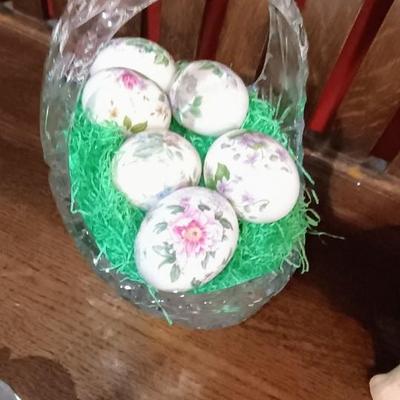 GLASS BASKET FILLED WITH HAND PAINTED CERAMIC EGGS