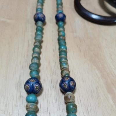Stone beaded necklace with trade beads and two wooden bangle bracelets