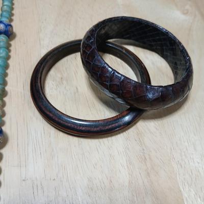Stone beaded necklace with trade beads and two wooden bangle bracelets