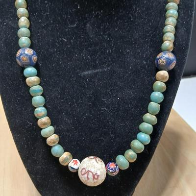 Stone beaded necklace with trade beads and two wooden bangle bracelets