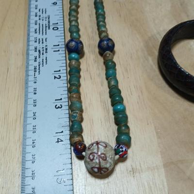 Stone beaded necklace with trade beads and two wooden bangle bracelets