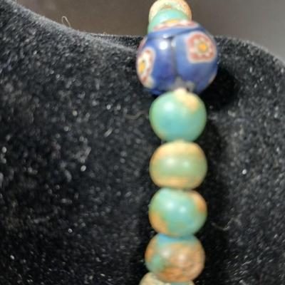 Stone beaded necklace with trade beads and two wooden bangle bracelets