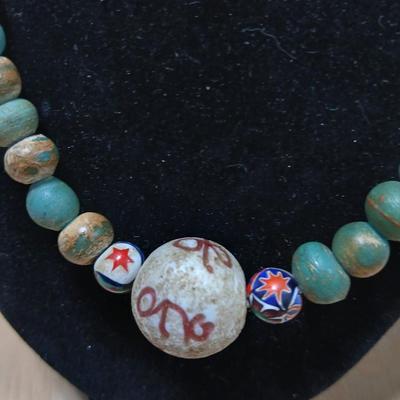 Stone beaded necklace with trade beads and two wooden bangle bracelets