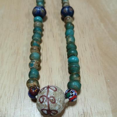 Stone beaded necklace with trade beads and two wooden bangle bracelets