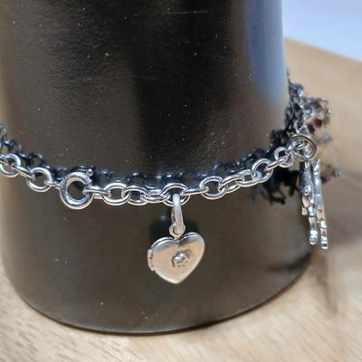 Wells Ster marked Charm bracelet Horses- Owl - Cat - Dog- Piano - Sterling bracelet