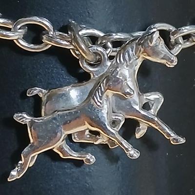 Wells Ster marked Charm bracelet Horses- Owl - Cat - Dog- Piano - Sterling bracelet