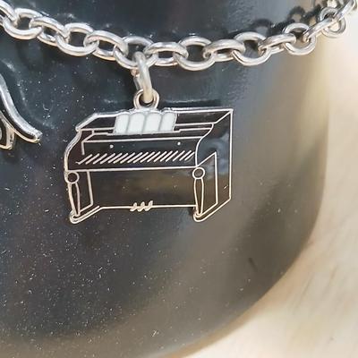 Wells Ster marked Charm bracelet Horses- Owl - Cat - Dog- Piano - Sterling bracelet