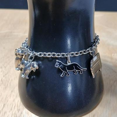 Wells Ster marked Charm bracelet Horses- Owl - Cat - Dog- Piano - Sterling bracelet