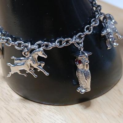 Wells Ster marked Charm bracelet Horses- Owl - Cat - Dog- Piano - Sterling bracelet