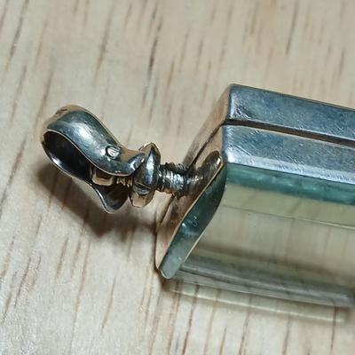 Dragonfly necklace, Glass box locket, blown glass mushroom pendant, and a Moose on a stone pendant