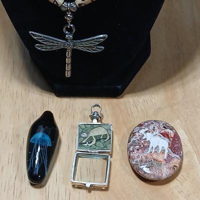 Dragonfly necklace, Glass box locket, blown glass mushroom pendant, and a Moose on a stone pendant