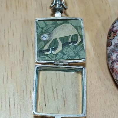 Dragonfly necklace, Glass box locket, blown glass mushroom pendant, and a Moose on a stone pendant