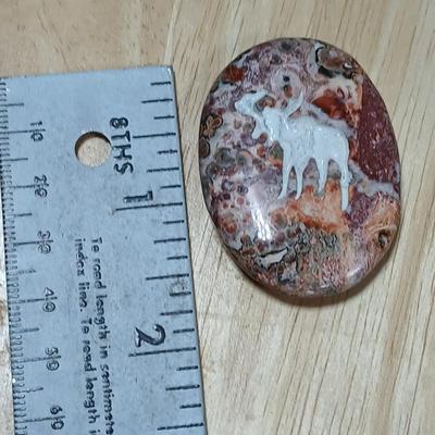 Dragonfly necklace, Glass box locket, blown glass mushroom pendant, and a Moose on a stone pendant