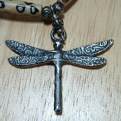 Dragonfly necklace, Glass box locket, blown glass mushroom pendant, and a Moose on a stone pendant