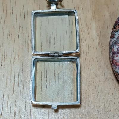 Dragonfly necklace, Glass box locket, blown glass mushroom pendant, and a Moose on a stone pendant