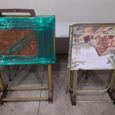 Sale Photo Thumbnail #64: 6 tables total. Four with the artwork on top and two just plain wood. 

Great condition on both sets