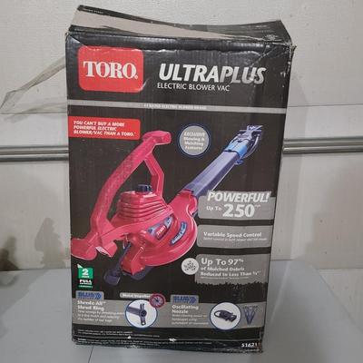 Sale Photo Thumbnail #67: Toro Electric blower like new condition. Doesn't even look like it was used.

The box has some damage but the blower has never been used and in original plastic.