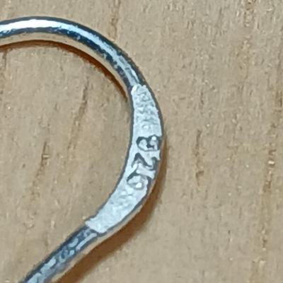 .925 marked dangle earrings and a sterling marked bracelet