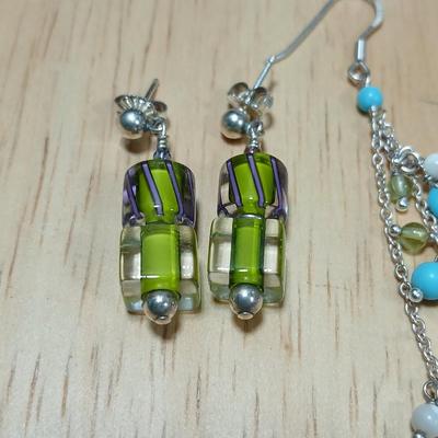 .925 marked dangle earrings and a sterling marked bracelet