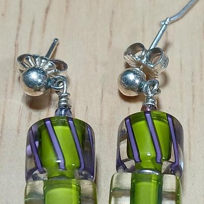 .925 marked dangle earrings and a sterling marked bracelet